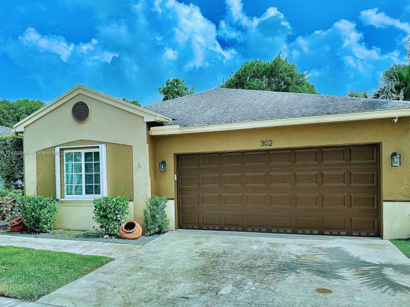 First Photo for Home For Sale at 302 E Riverbend Dr Sunrise, FL. 33326