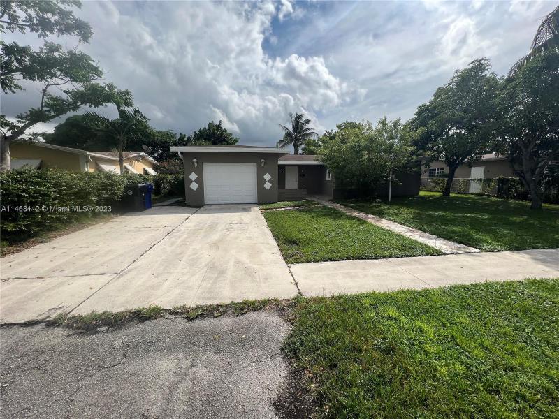 First Photo for Home For Sale at 6820 SW 7th Ct North Lauderdale, FL. 33068