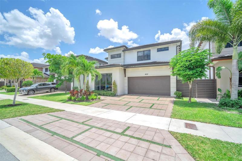 First Photo for Home For Sale at 8814 NW 154th Ter Miami Lakes, FL. 33018
