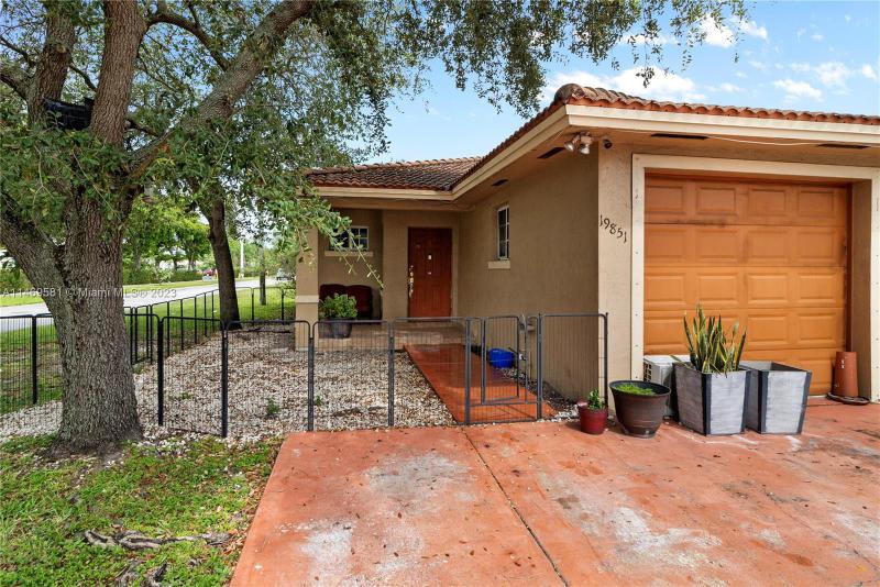 First Photo for Home For Sale at 19851 E Cypress Ct E  Hialeah, FL. 33015