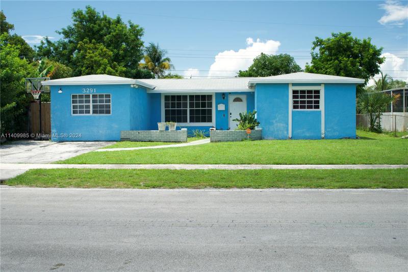 First Photo for Home For Sale at 3291 NW 42nd St Lauderdale Lakes, FL. 33309