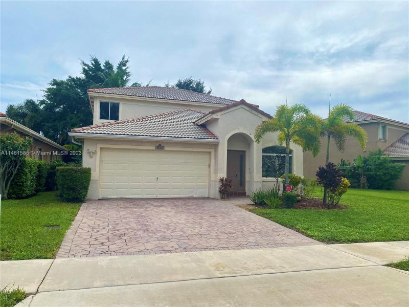 First Photo for Home For Sale at 5122  Woodfield Way Coconut Creek, FL. 33073