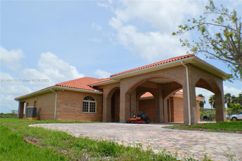 First Photo for Home For Sale at 31002 SW 212th Ave Homestead, FL. 33030