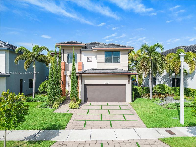 First Photo for Home For Sale at 16044 NW 87th Ct Miami Lakes, FL. 33018