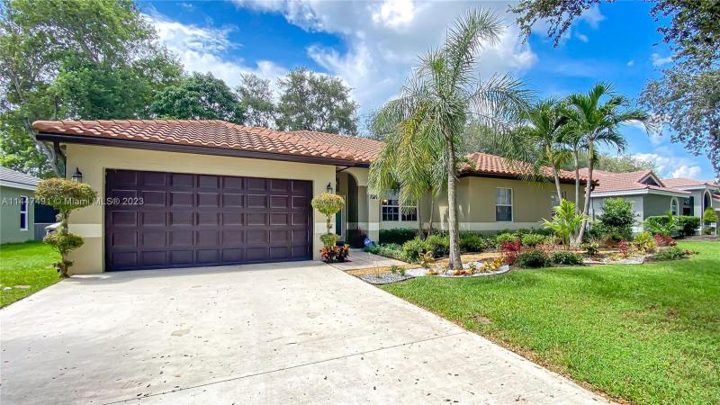 First Photo for Home For Sale at 4140 NW 58th St Coconut Creek, FL. 33073