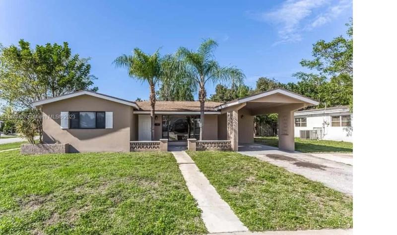 First Photo for Home For Sale at 3401 NW 38th Ter Lauderdale Lakes, FL. 33309