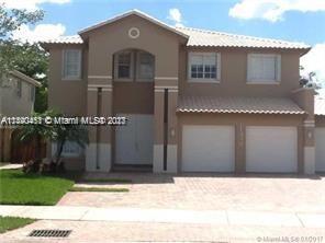 First Photo for Home For Sale at 11390 NW 61st St Doral, FL. 33178