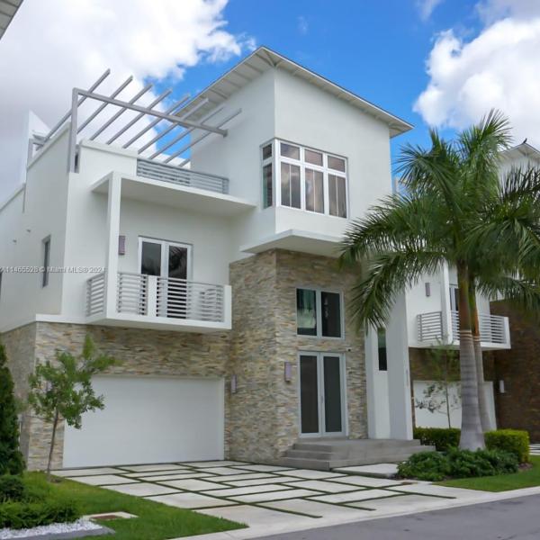 First Photo for Home For Sale at 8265 Nw 34 Drive  Drive Doral, FL. 33122