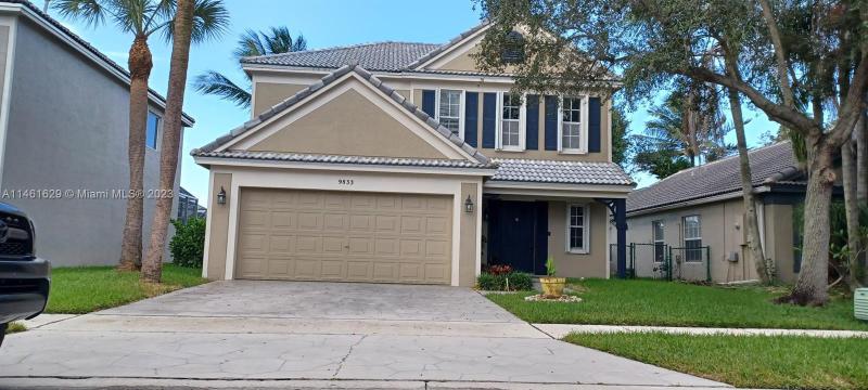 First Photo for Home For Sale at 9833 N Grand Duke Cir Tamarac, FL. 33321