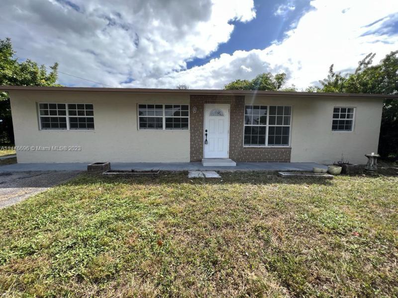 First Photo for Home For Sale at 3200 NW 18th St Lauderhill, FL. 33311