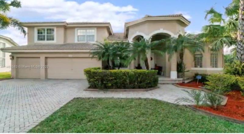 First Photo for Home For Sale at 1860 NW 168th Ave Pembroke Pines, FL. 33028