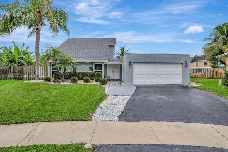 First Photo for Home For Sale at 9311 NW 36th Pl Sunrise, FL. 33351