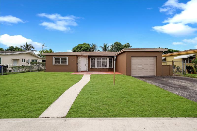 First Photo for Home For Sale at 3971 NW 50th Ave Lauderdale Lakes, FL. 33319
