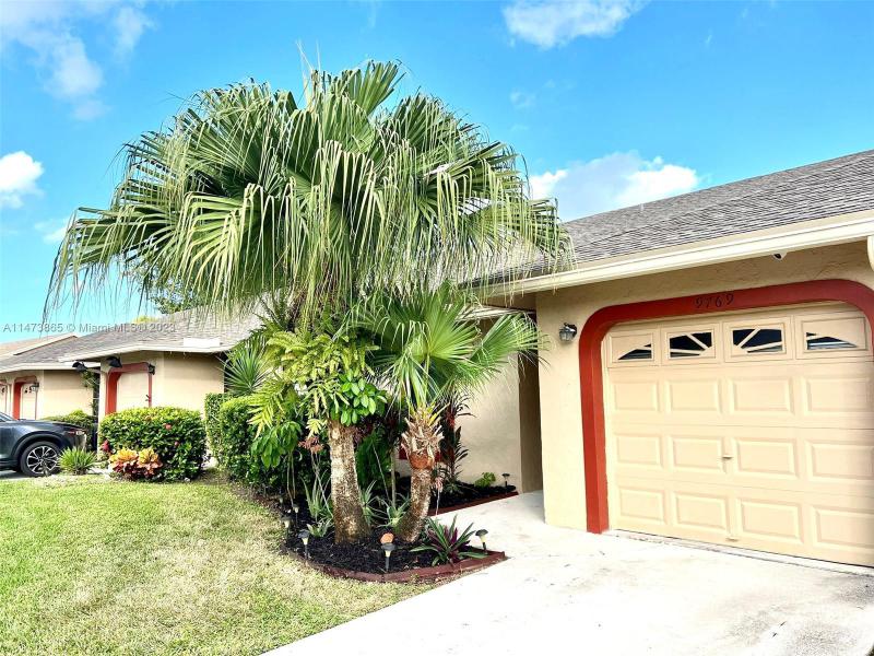 First Photo for Home For Sale at 9769 NW 76th Ct . Tamarac, FL. 33321
