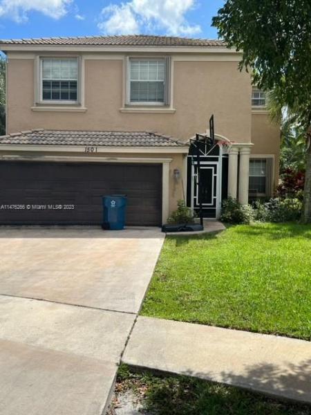 First Photo for Home For Sale at 1501  Running Oak Ln Royal Palm Beach, FL. 33411