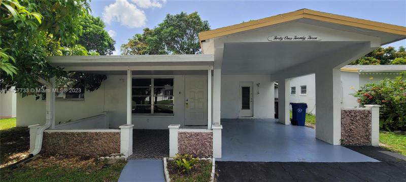 First Photo for Home For Sale at 4123 NW 52nd Ave Lauderdale Lakes, FL. 33319