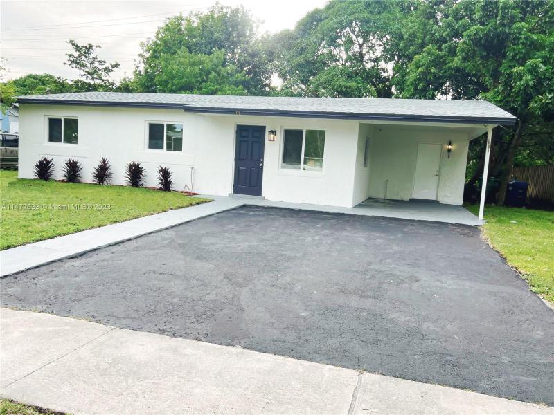 First Photo for Home For Sale at 1421 NW 51st Ave Lauderhill, FL. 33313
