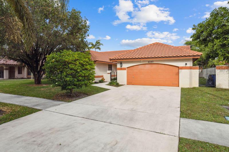 First Photo for Home For Sale at 4157 NW 4th Deerfield Beach, FL. 33442