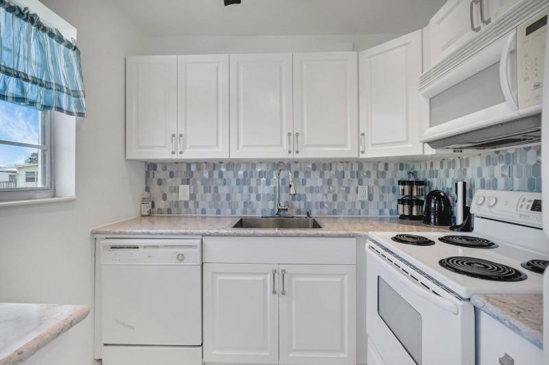First Photo for Home For Sale at  Deerfield Beach, FL. 33442