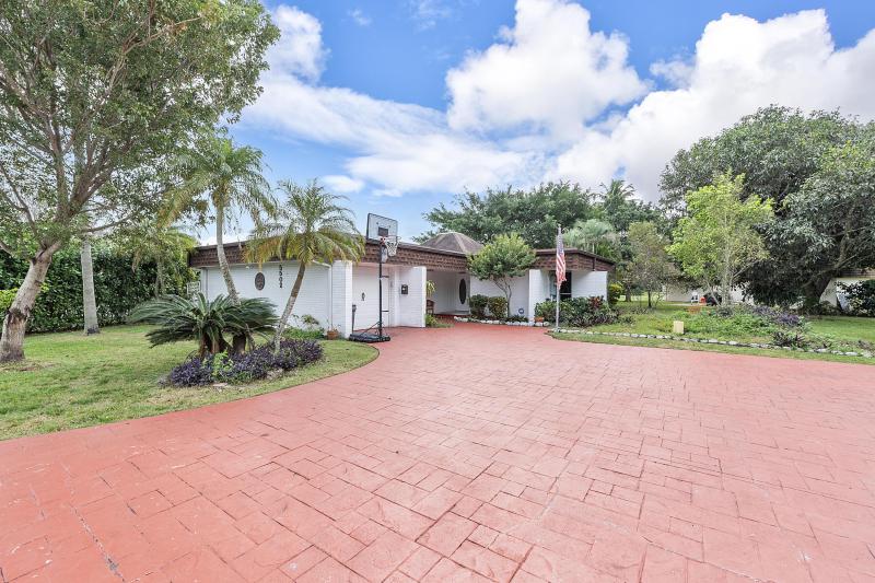 First Photo for Home For Sale at 5502  Mulberry Tamarac, FL. 33319