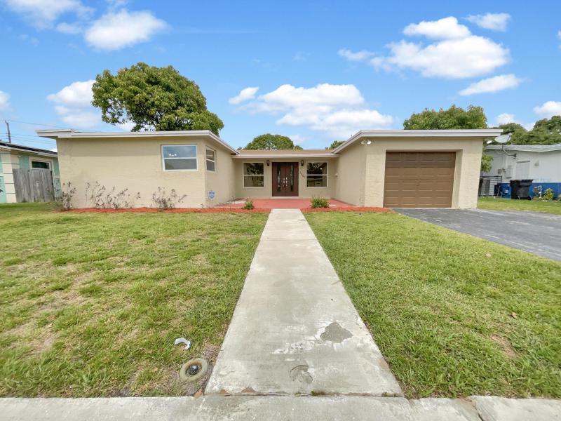 First Photo for Home For Sale at 3583 NW 40th Lauderdale Lakes, FL. 33309