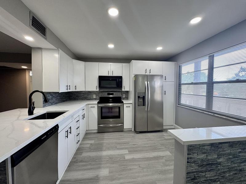 First Photo for Home For Sale at  Coconut Creek, FL. 33066