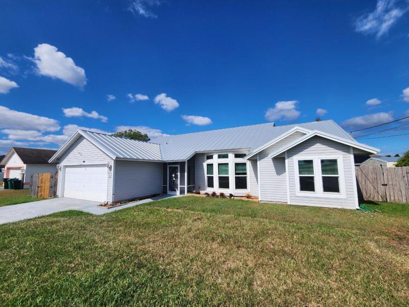 First Photo for Home For Sale at 733 SW Acapulco Port Saint Lucie, FL. 34953